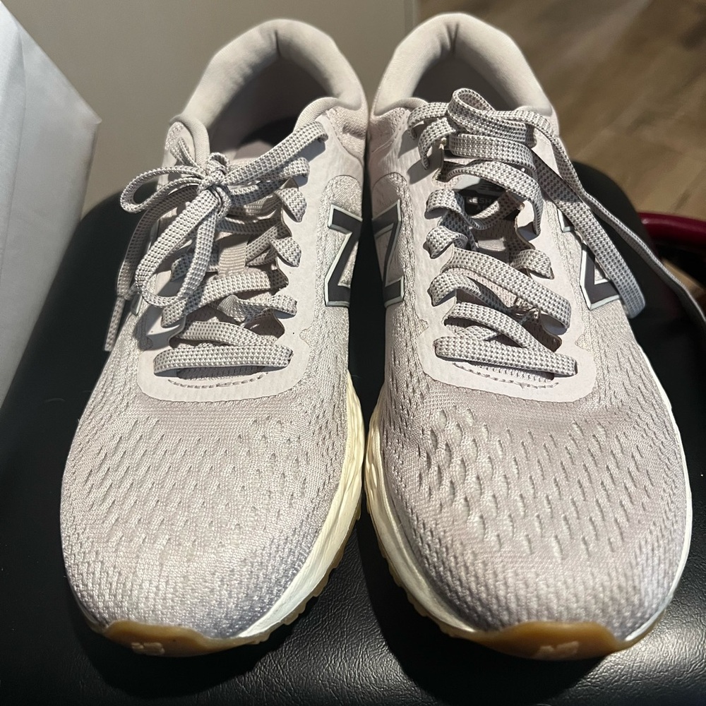New Balance Women's Sneakers in Pale Gray with Black Logo